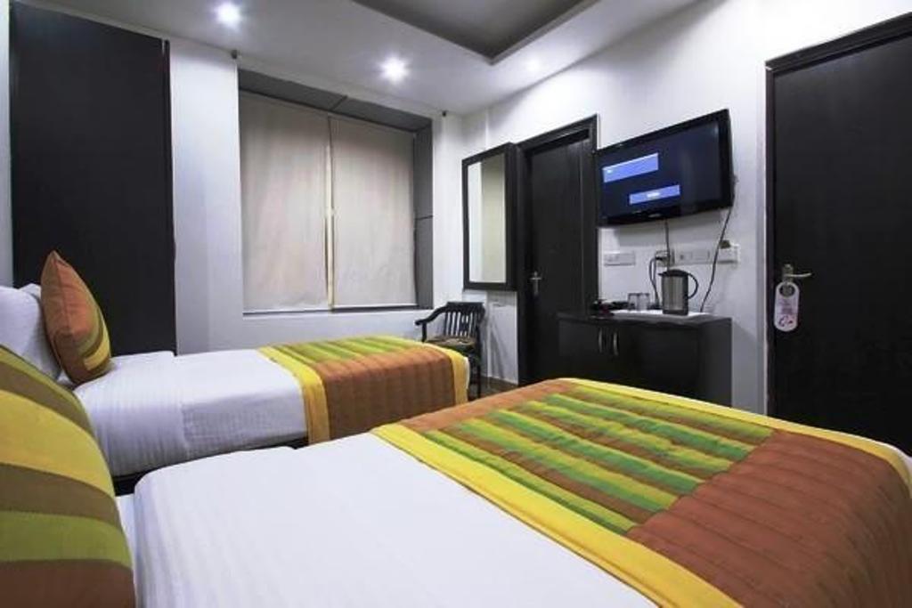 Hotel Universe Inn Új-Delhi Szoba fotó